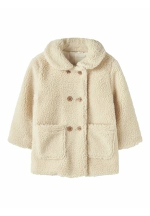 Manteau teddy couleur crème, duveteux, avec large col, boutons en bois croisés, manches longues et deux poches avant.