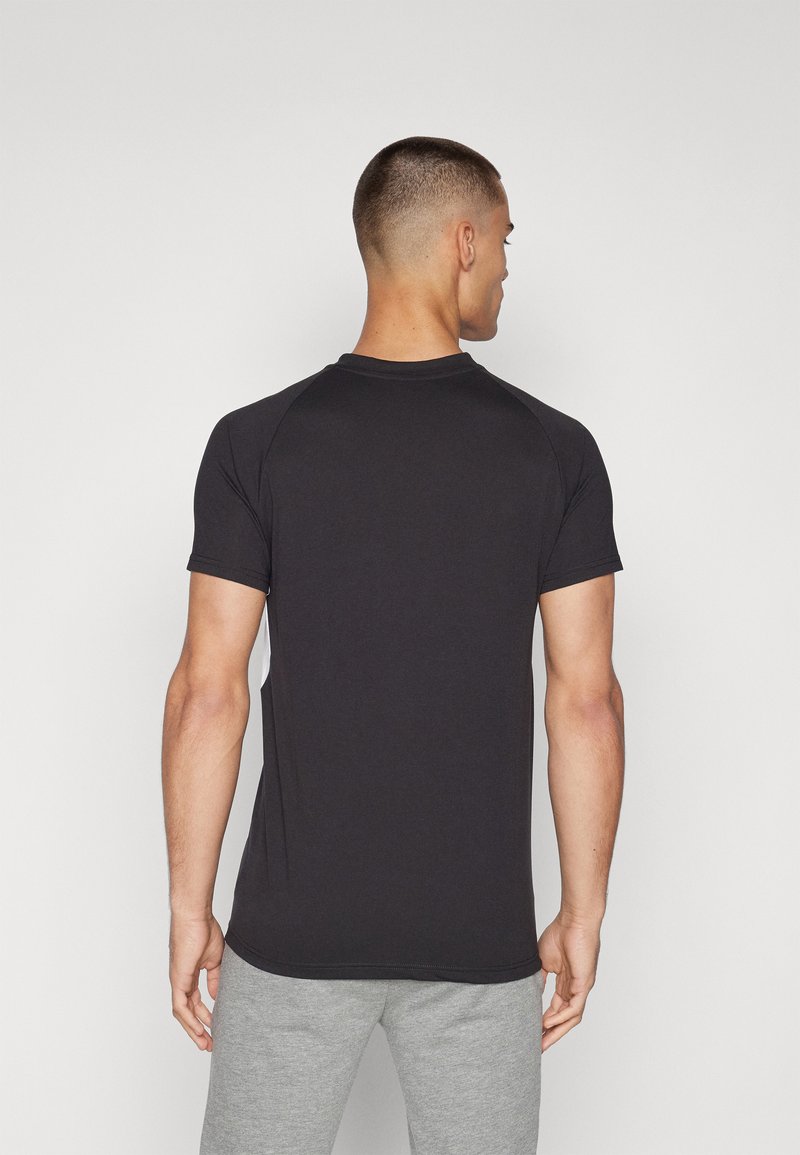 Puma TEE - Triko s potiskem - black