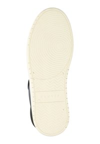 Black sneaker with a textured rubber upper and a white rubber sole featuring a herringbone pattern. Branding visible on the sole.