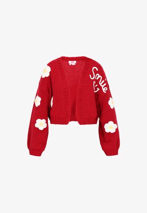 Piros kötött kardigán, cropped fazonnal. Fehér virág motívumok díszítik az ujjakat, az elején pedig "Smile" felirat található. Rugalmas szegély és mandzsetta.