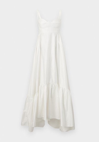 Valge puuvillane maksikleit, millel on sobiv kehakujundus, õhukesed kummipaelad ja kihiline volangiga alläär. Sile tekstuur ja õrn sära üle kogu kleidi.