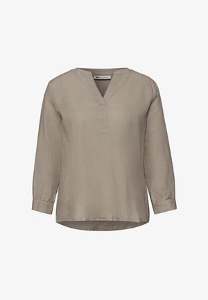 Beige Bluse mit langen Ärmeln, V-Ausschnitt, lockerer Passform und geknöpften Manschetten, aus leichtem Stoff.