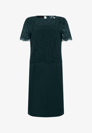 Dunkelgrünes knieumspielendes Kleid mit kurzen Spitzärmeln und einem Spitzenoberteil mit Blumenmuster und gezackten Kanten.