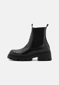 Enkellaarsjes met plateauzool - black