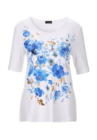 Witte T-shirt met korte mouwen, voorzien van een blauwe bloemenprint met gouden accenten. Ronde halslijn, zachte textuur en een losse pasvorm.