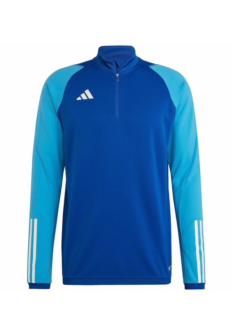 Blauwe sportjacket met lange mouwen, halve rits kraag, lichtblauwe accenten en wit drie-strepen logo op de mouwen. Glad materiaal, sportief ontwerp.