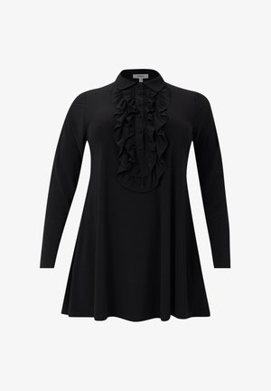 Schwarze Langarm-Tunika mit Rüschen an der Knopfleiste und rundem Kragen, leicht ausgestellt am Saum.