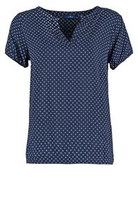 Blusa blu navy a maniche corte con scollatura a V, caratterizzata da un motivo floreale bianco ripetuto su tutta la stoffa. Materiale morbido e leggero.