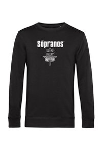 Maglietta nera a maniche lunghe con il testo "The Sopranos", una silhouette di pistola nella lettera "r" e una croce bianca sopra un grafico di una corona.