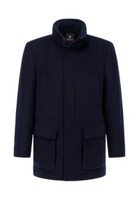 Manteau en laine navy avec un col haut, deux poches avant et une coupe droite qui offre une silhouette épurée et minimale.