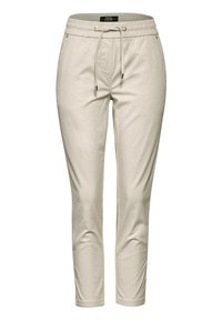 Beiga joggerbyxor i bomullsblandning med elastisk midja, snörning och avsmalnande ben. Har sidofickor och en mjuk textur.