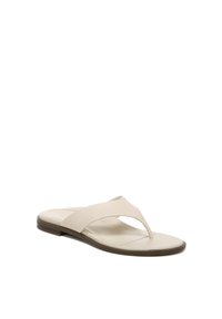 Light beige thong sandal with a textured upper, flat sole, and a smooth insole. Features two crossing straps for a secure fit.