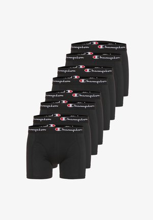 Stapel von sieben schwarzen Herren-Boxershorts mit Champion-Logo auf den elastischen Bundbändern.