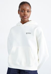 New Balance LINEAR HERITAGE BRUSHED BACK - Sweat à capuche - seasalt