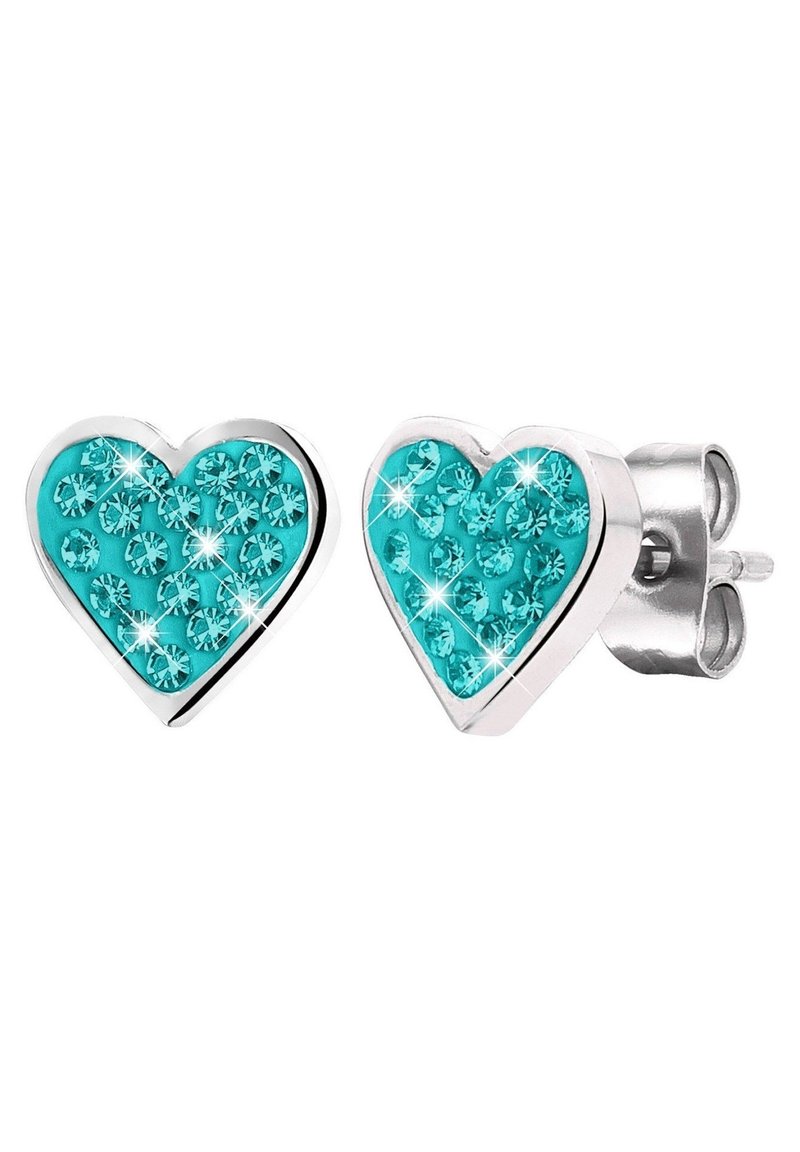 Hartvormige oorbellen met turquoise edelstenen, gezet in een zilverkleurig metaal. De stenen hebben een sprankelende afwerking en een gladde textuur.