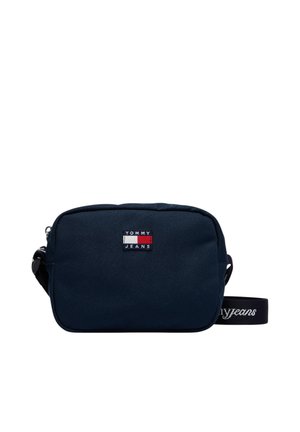 Borsa a tracolla compatta Tommy Jeans blu navy con forma rettangolare e patch con logo del brand sul davanti.
