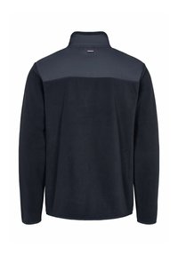 Veste en polaire noire à manches longues avec un col montant et un petit logo rectangulaire rouge, blanc et bleu sur le haut du dos.