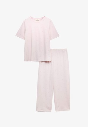 Ensemble de pyjama rose clair à manches courtes avec de petits motifs floraux blancs, comprenant un haut à col rond et un pantalon ample à taille élastique.