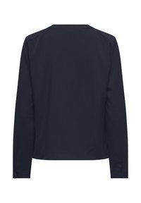 Chemise à manches longues bleu marine avec une texture lisse et un design simple. Dotée d'un col rond et sans embellissements au dos.