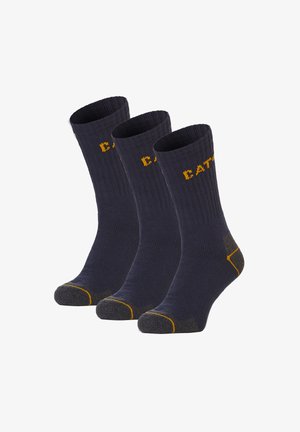Drei Paar dunkelblauer Socken mit geripptem Muster. Mit gelben Akzenten und verstärkten grauen Fersen- und Zehenbereichen. Das Wort "DATH" ist in Gelb eingestrickt.