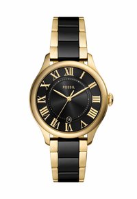 Fossil ur med sort urskive, guldfarvet metal bezel og romerske tal. Har et armbånd i sort og guld linkdesign samt datovisning.