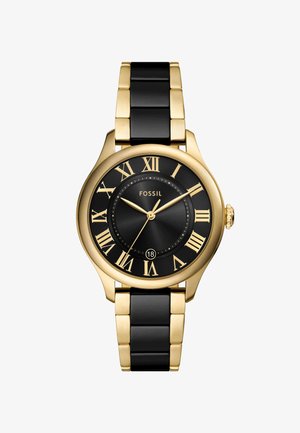 Fossil watch with a black dial, gold-tone metal bezel, and Roman numeral markers. Features a black and gold link bracelet and date display.