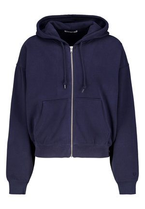 Navyblauwe cropped hoodie gemaakt van zachte katoen met een rits aan de voorkant, twee voorzakken en een capuchon met trekkoord. Geribde manchetten en onderrand.