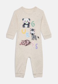 Combinaison en beige à manches longues avec des appliqués d'animaux (panda, zèbre, hippopotame) et des lettres colorées. Tissu doux avec fermeture à pression au niveau du col.