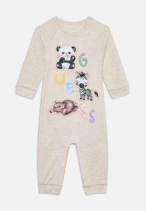 Combinaison en beige à manches longues avec des appliqués d'animaux (panda, zèbre, hippopotame) et des lettres colorées. Tissu doux avec fermeture à pression au niveau du col.