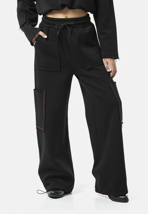 WEITER SCHNITT - Trainingsbroek - schwarz