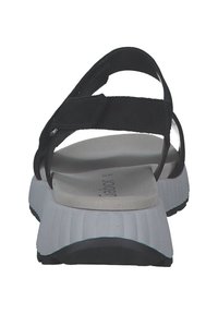 Zwarte sandalen met verstelbare banden, een grijze textuurzool en een lichtgrijze voetbed. Beschikt over een comfortabel, contoured ontwerp.