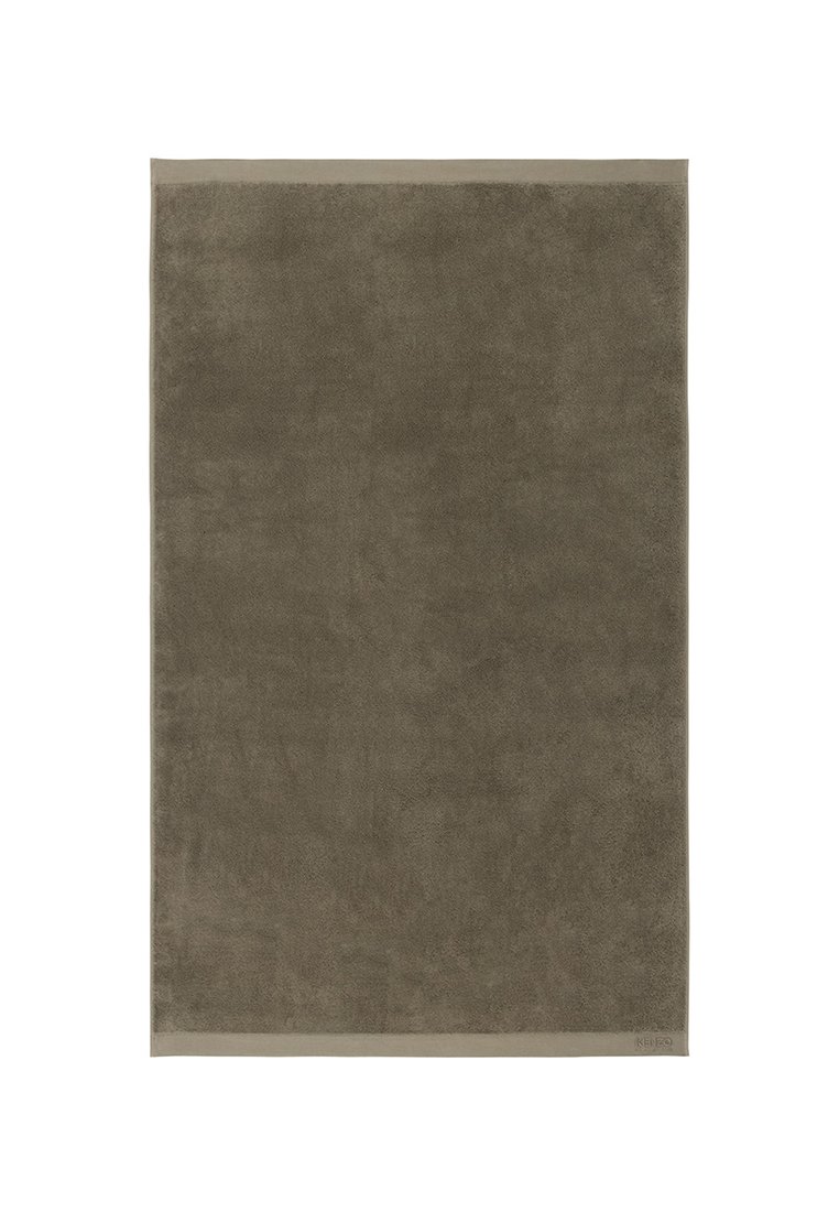 Serviette en coton brun avec une texture douce, de forme rectangulaire, et une bordure subtile. Aucun motif ni détail en métal n'est présent.
