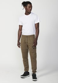 Koroshi Pantaloni de trening - vison   mink light brown