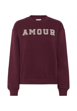 Sweatshirt bordeaux avec le mot "AMOUR" en lettres crème. Équipé de poignets et d'un col côtelés, et d'une coupe décontractée. Tissu en mélange de coton doux.