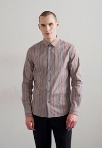 Striped button-up shirt with a collar, featuring varied colors in thin vertical lines. Long sleeves, tailored fit, and a smooth texture.