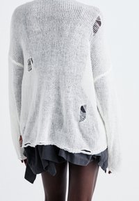 The Ragged Priest Sweter