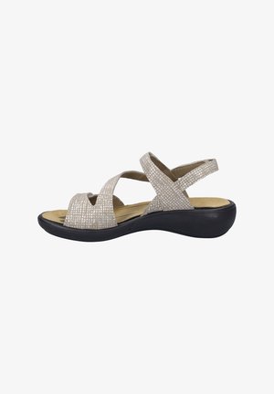 Beige sandaal met kruisbanden, een gestructureerde bovenkant, open teen en een gevoerde voetbed, met een lage zwarte wigzool.