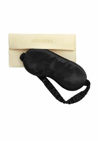 Svart satin ögonmask med elastiskt band, tillsammans med en krämfärgad tygpåse med präglad text "LENOITES". Påsen har en klaffstängning.