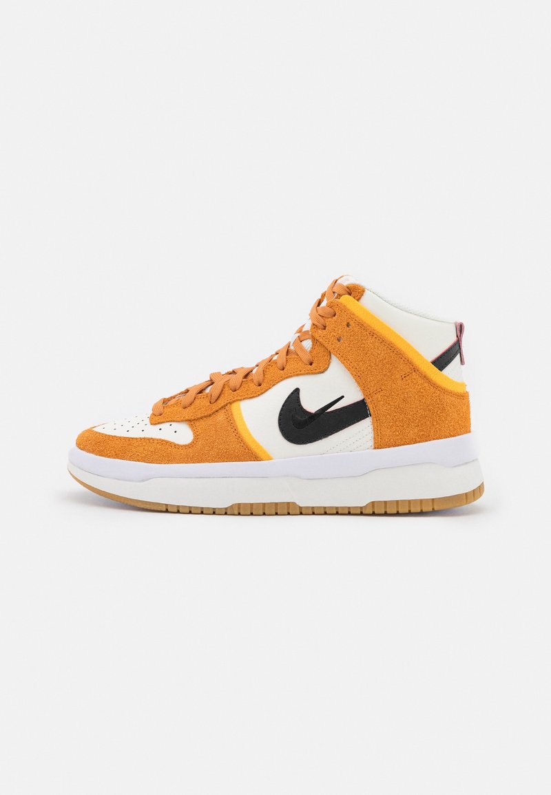 High-top sneaker with orange suede and white leather panels, black Nike swoosh, orange laces, and white sole with gum outsole.