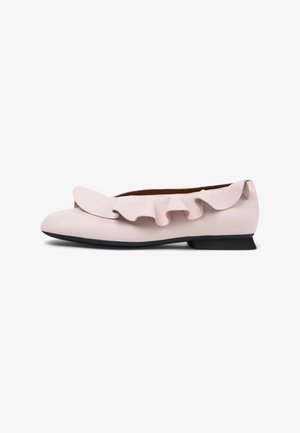 Light pink leather ballet flat with ruffled accent along the vamp, rounded toe, and a low black heel. Smooth texture and simple design.