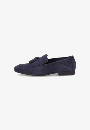Mocasín de ante azul marino para hombre con detalle de borla, tacón bajo negro y diseño sin cordones.