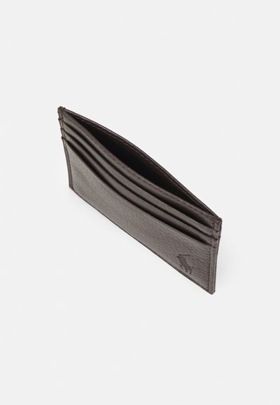 Dark brown leather wallet with multiple card slots, textured surface, and a logo embossed on one side. Slim, rectangular design.