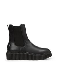 Bottines en cuir noir avec panneaux élastiques sur les côtés, bout rond et semelle épaisse crantée. Elles disposent d'une languette à l'arrière pour un enfilage facile.