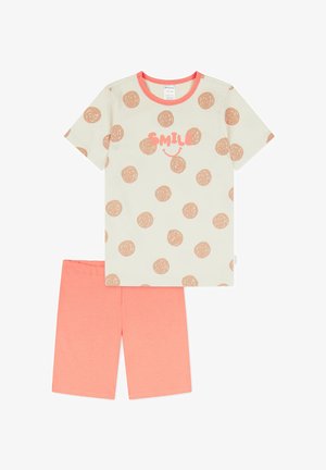 Helle beige Schlafanzug-Set mit einem kurzärmeligen Oberteil, das braune kreisförmige Muster und das Wort "SMILE" in Pink zeigt, kombiniert mit korallfarbenen Shorts.