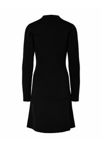 Abito lungo a maniche lunghe nero a coste con colletto, corpetto aderente, orlo svasato e spacchi laterali per facilitare i movimenti. Texture morbida.