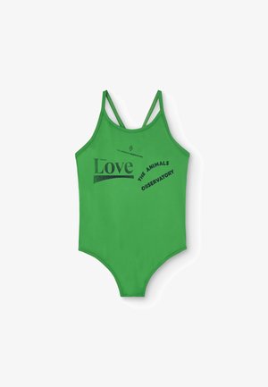 Maillot de bain vert au design ajusté. Doté de bretelles réglables et d'un texte imprimé en noir : "Toujours aimer THE ANIMALS OBSERVATORY."