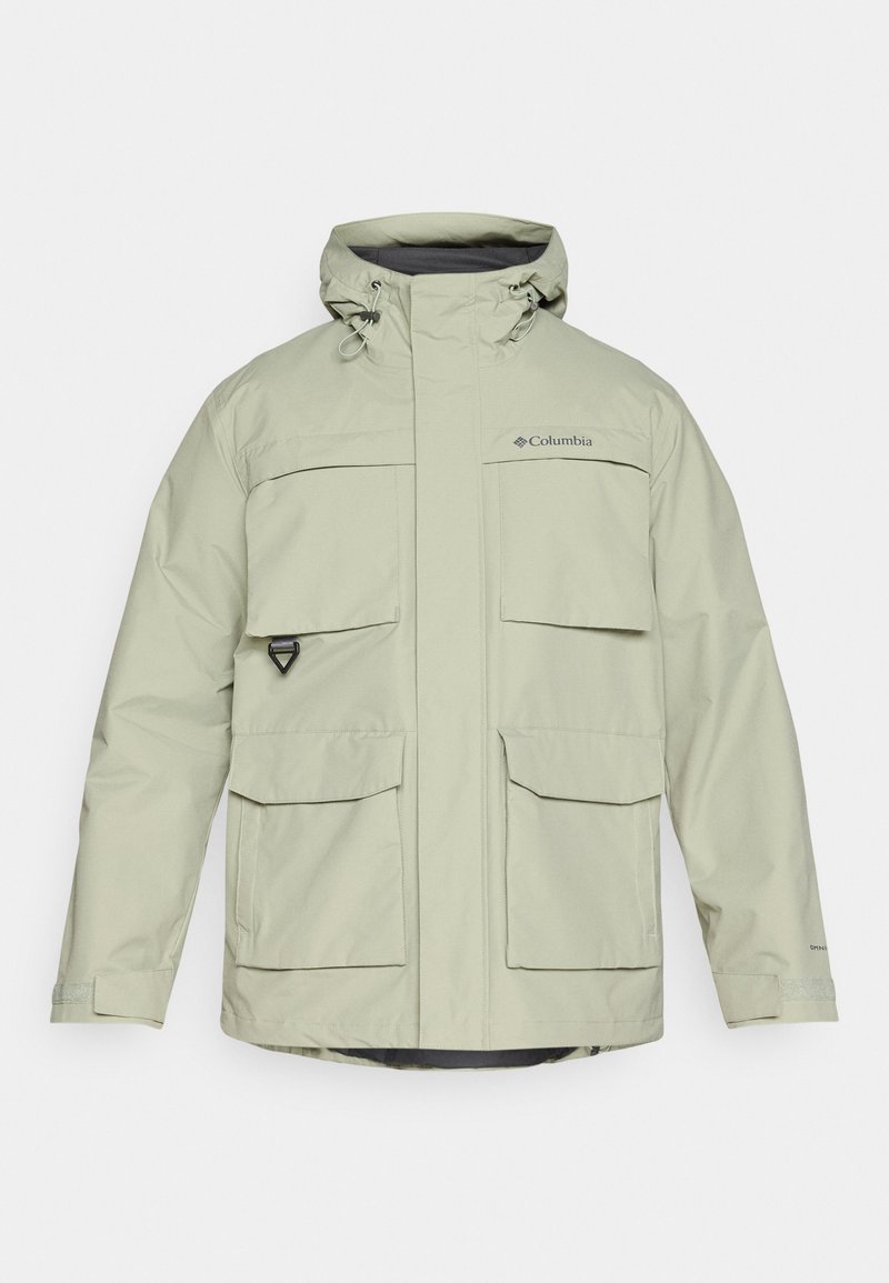 Jasnozielona kurtka Columbia z kapturem, z wieloma przednimi kieszeniami i zapięciem na zamek. Wykonana z materiału wodoodpornego o gładkiej teksturze.