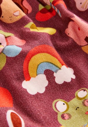 Patterned fabric featuring a purple background with bright illustrations of animals, rainbows, and colorful shapes. Textured cotton or polyester.