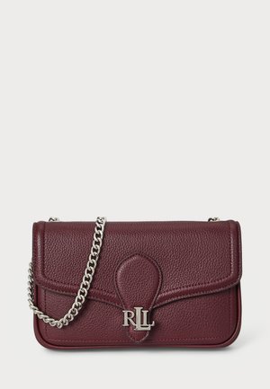 Burgundy leather handbag with a textured finish, silver chain strap, and front flap featuring a logo accent and stitched detailing.