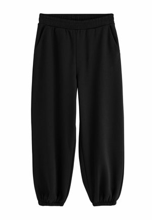 Pantaloni della tuta neri con vita elastica, tasche laterali e polsini elastici alle caviglie, realizzati in tessuto morbido e confortevole.
